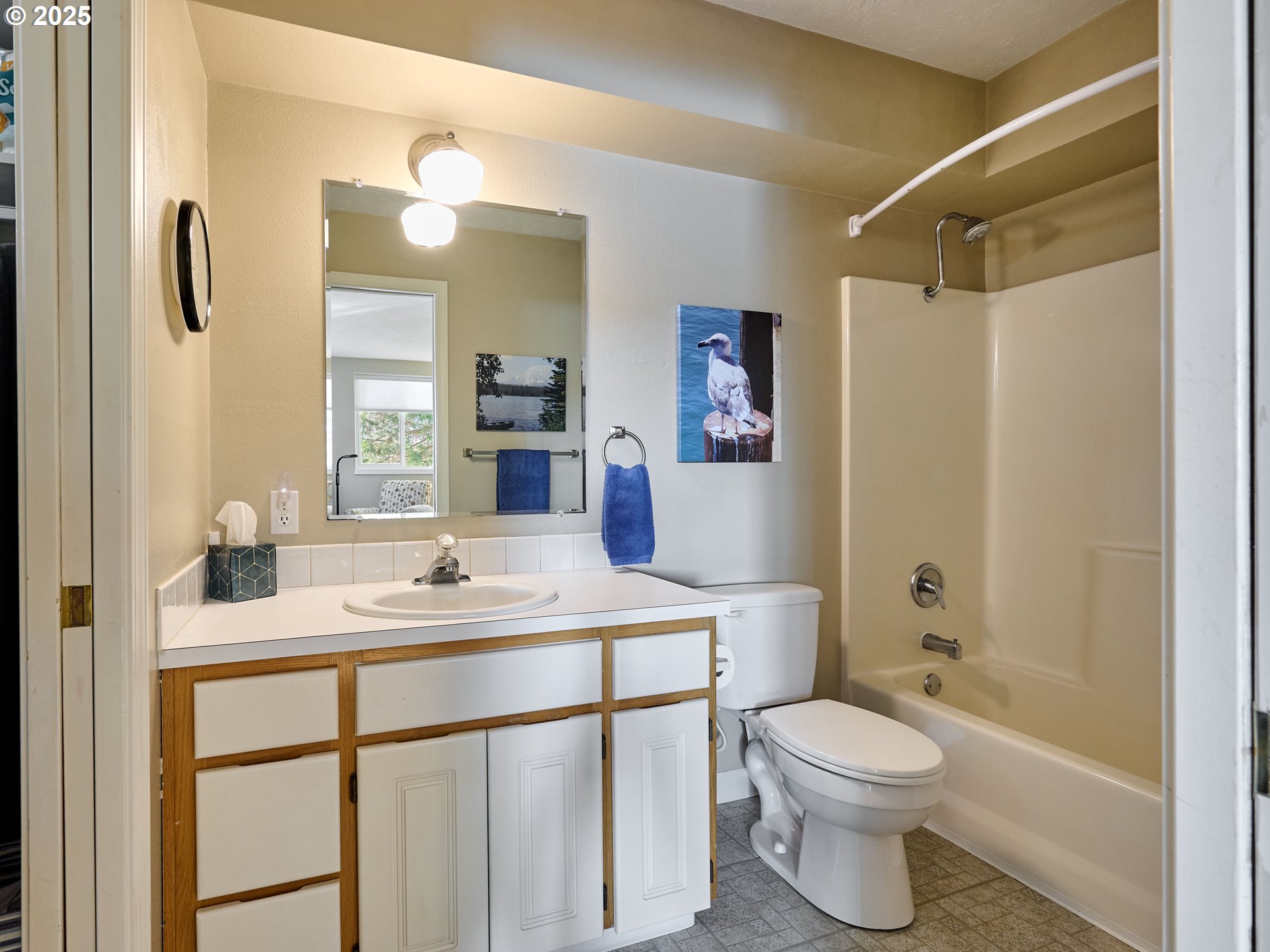 920 Hermanson Street Woodburn, OR 97071 - Photo 22 of 48 a bathroom with a sink toilet vanity and shower