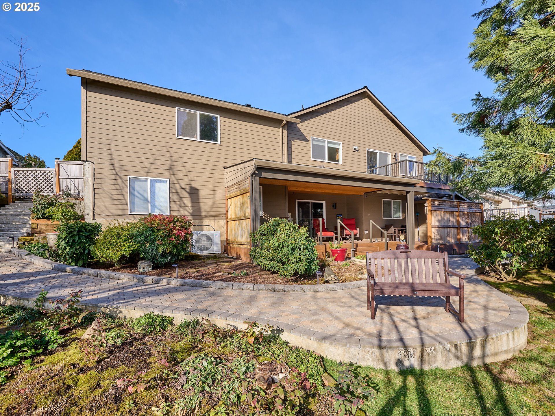 920 Hermanson Street Woodburn, OR 97071 - Photo 30 of 48 a view of a house with a patio