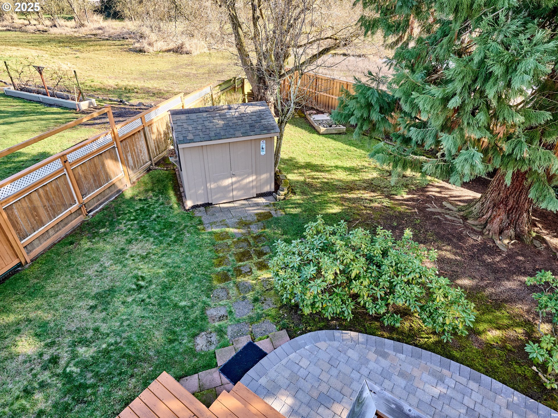 920 Hermanson Street Woodburn, OR 97071 - Photo 36 of 48 a view of a yard with an outdoor space
