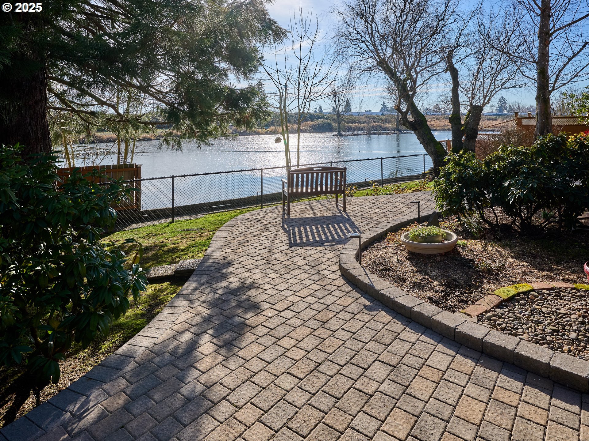 920 Hermanson Street Woodburn, OR 97071 - Photo 40 of 48 a view of a backyard with pathway