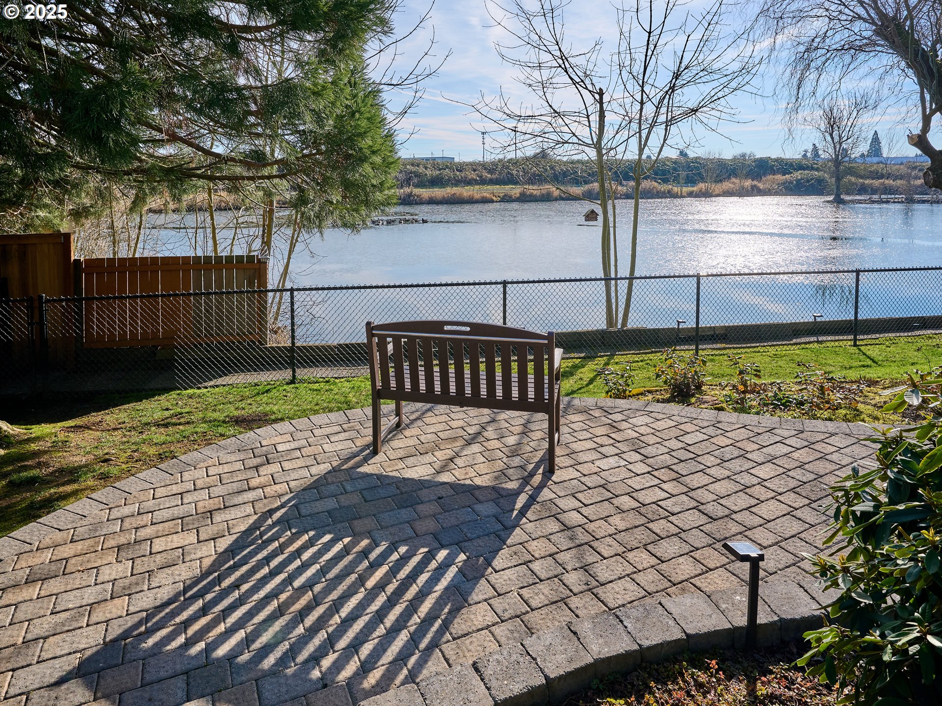 920 Hermanson Street Woodburn, OR 97071 - Photo 41 of 48 a view of street with wooden fence