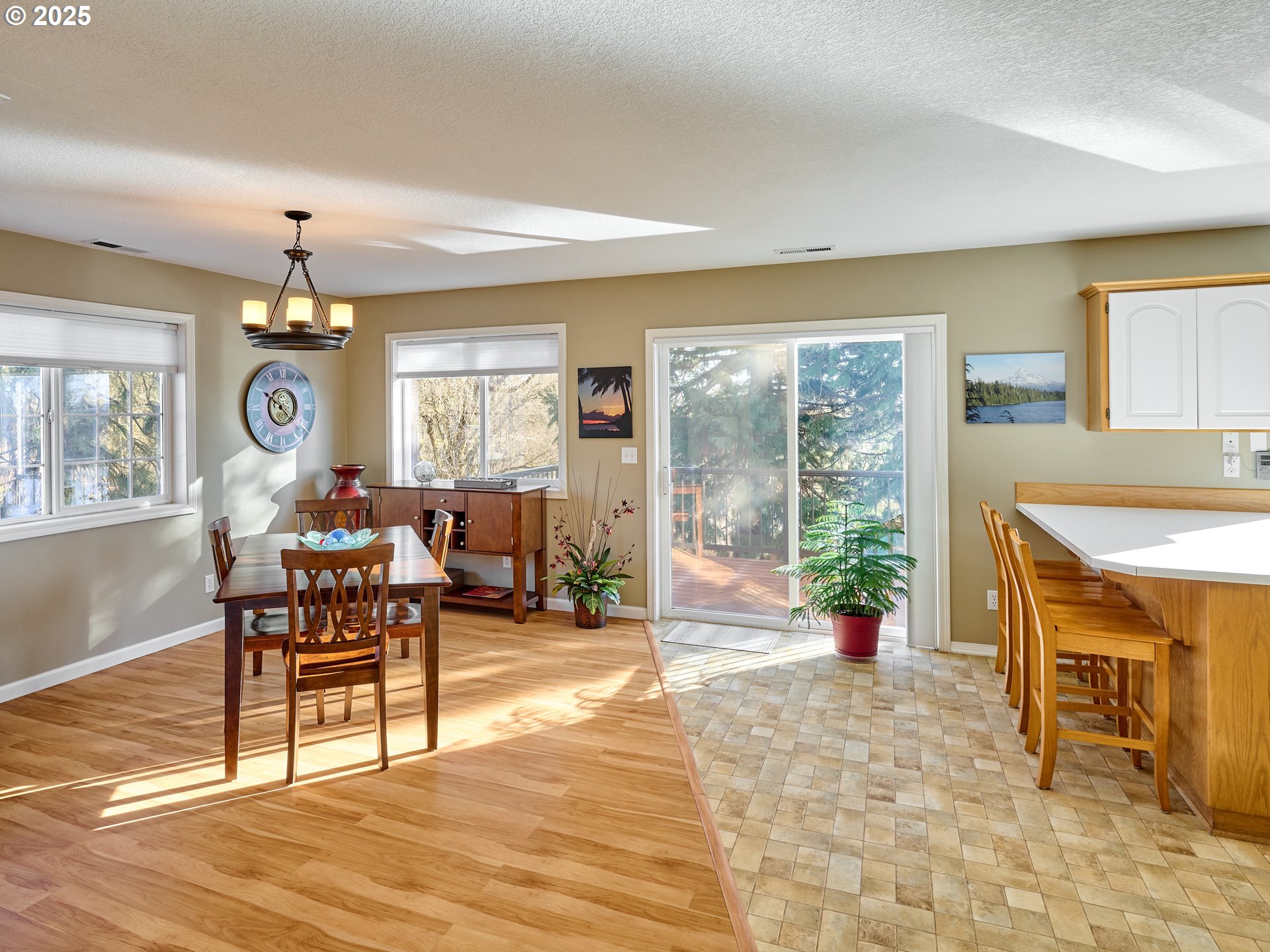 920 Hermanson Street Woodburn, OR 97071 - Photo 8 of 48 a living room with furniture a window and a dining table