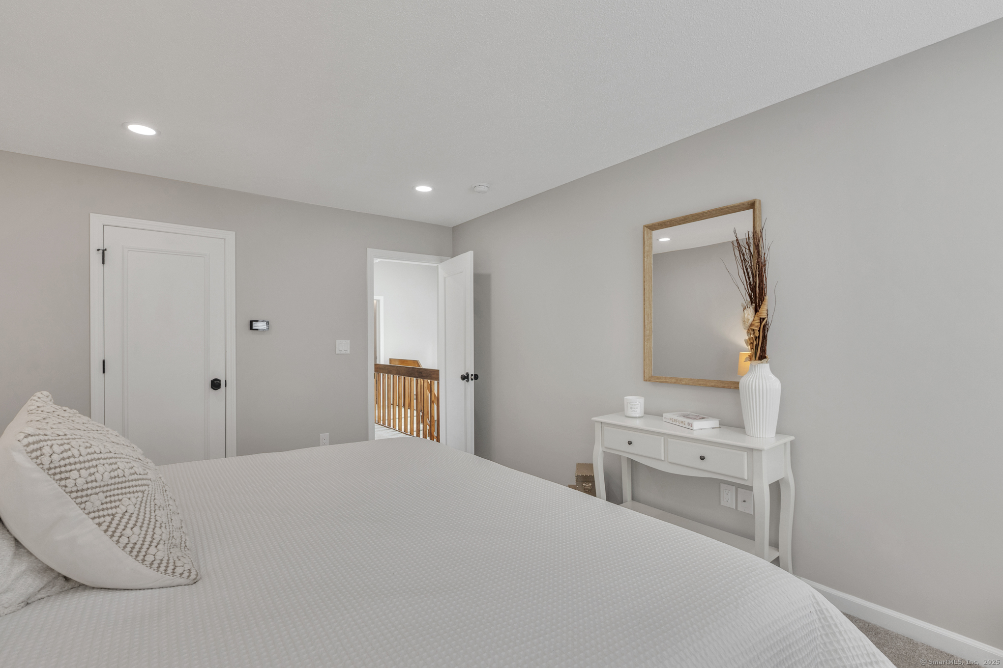 16 Maple Street, Unit 11 Vernon, CT 06066 - Photo 18 of 29 a bedroom with a bed and a tv