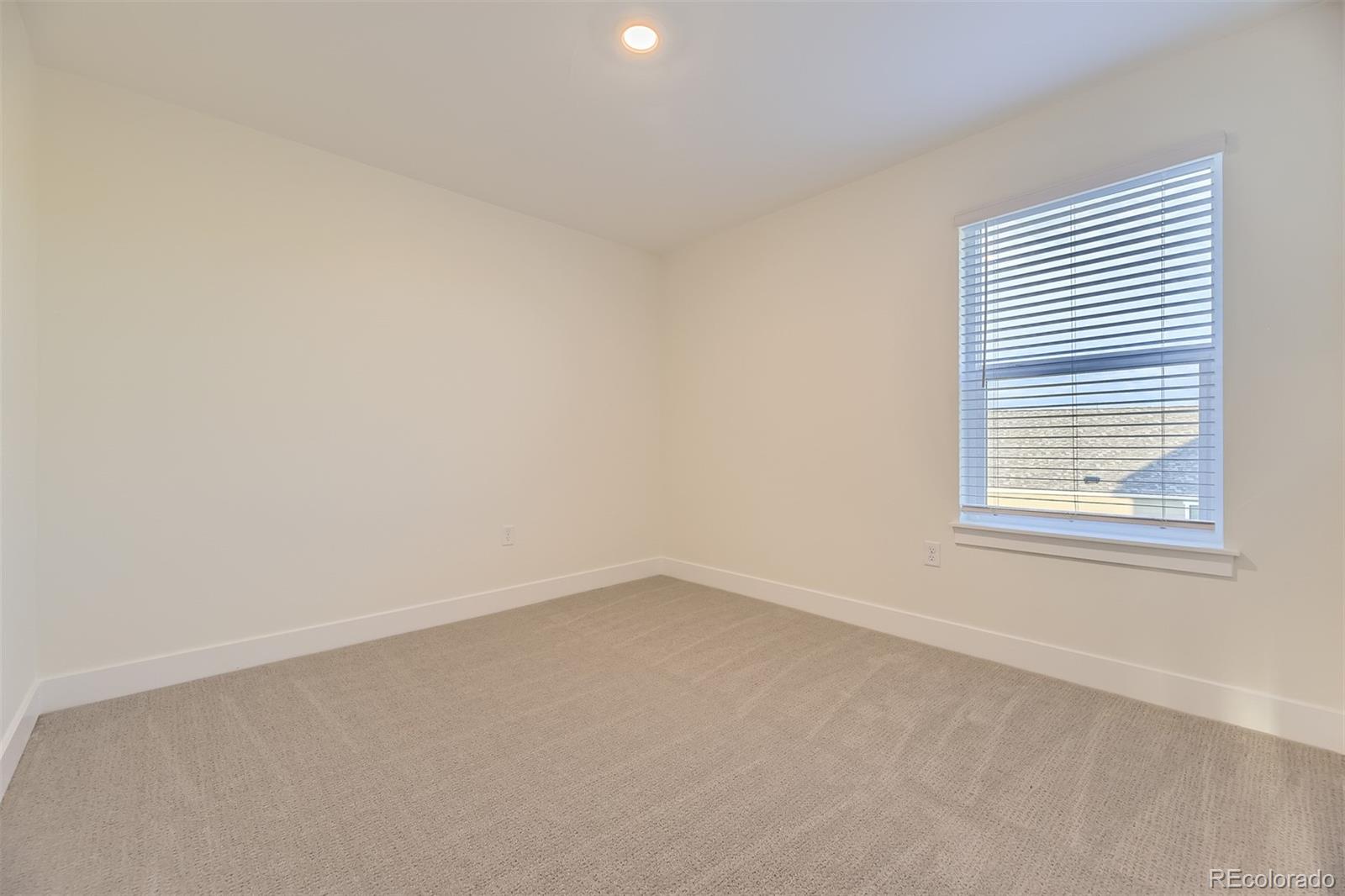 42984 Colonial Trail Elizabeth, CO 80107 - Photo 19 of 31 an empty room with a window