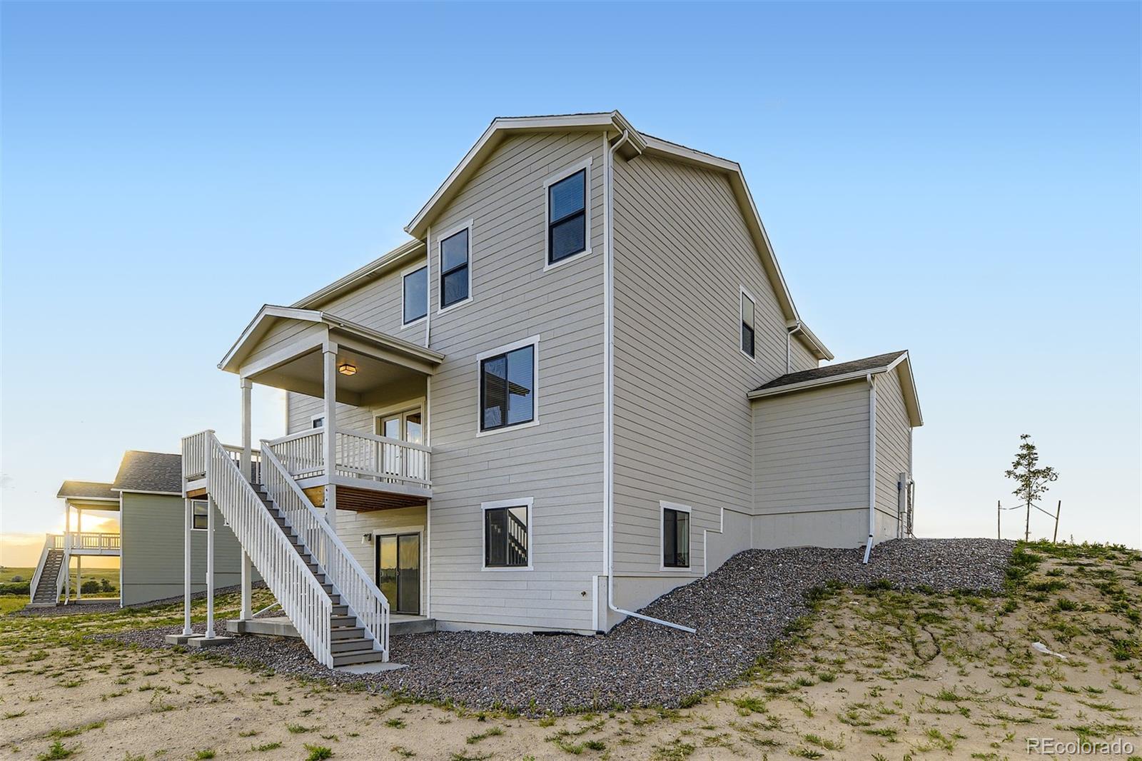 42984 Colonial Trail Elizabeth, CO 80107 - Photo 4 of 31 a front view of a house with a yard