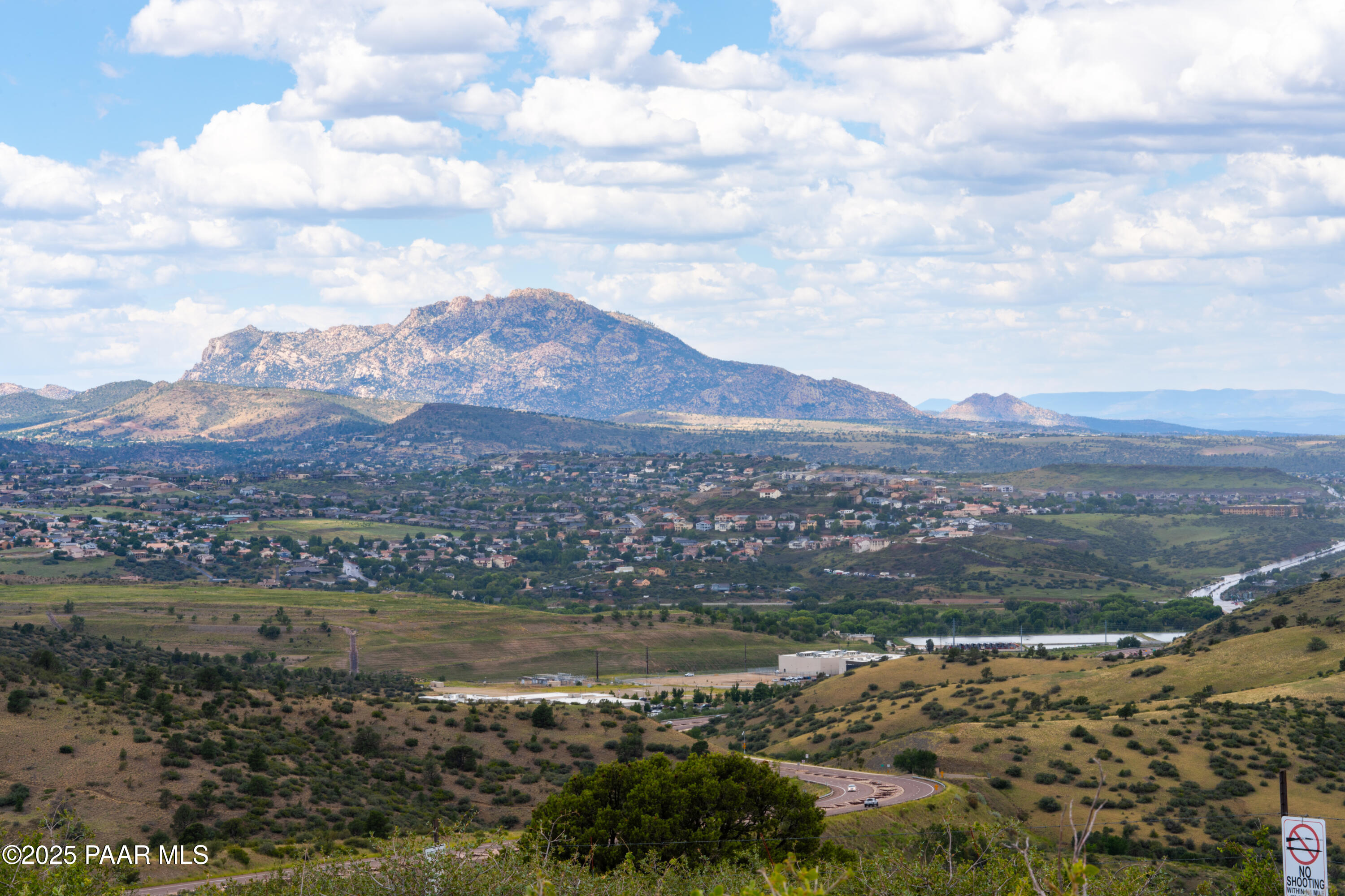 a view of a lake with mountains in the background