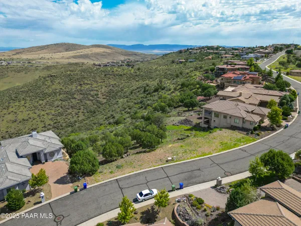 an aerial view of a house with a garden