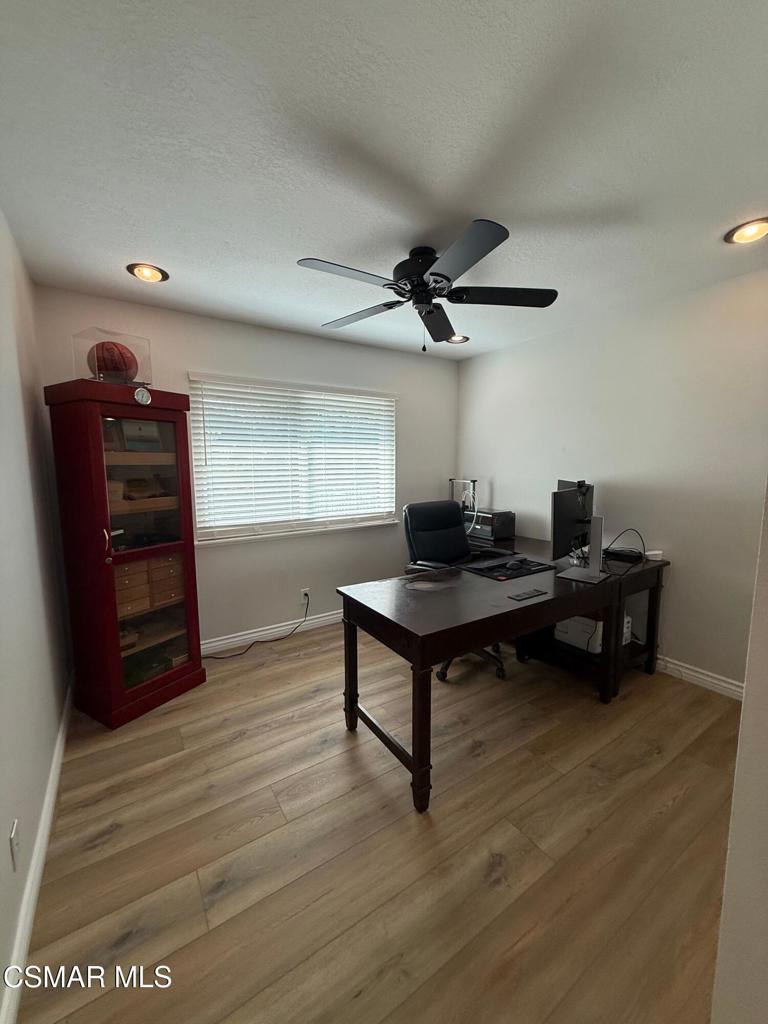 259 Sinaloa Road Simi Valley, CA 93065 - Photo 12 of 17 a view of a workspace with furniture and wooden floor