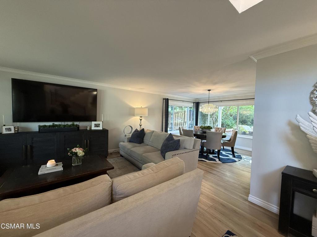 259 Sinaloa Road Simi Valley, CA 93065 - Photo 2 of 17 a living room with furniture and a flat screen tv
