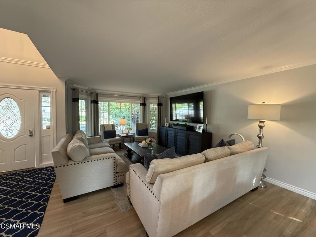 259 Sinaloa Road Simi Valley, CA 93065 - Photo 3 of 17 a living room with furniture and wooden floor