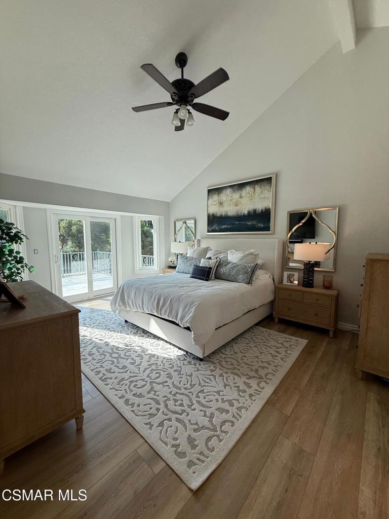 259 Sinaloa Road Simi Valley, CA 93065 - Photo 10 of 17 a bedroom with a large bed and a couch