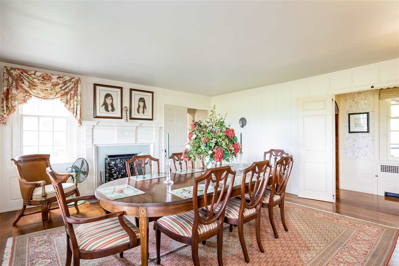388 Rockfish Road Waynesboro, VA 22980 - Photo 11 of 50 a view of a dining room with furniture and a fireplace