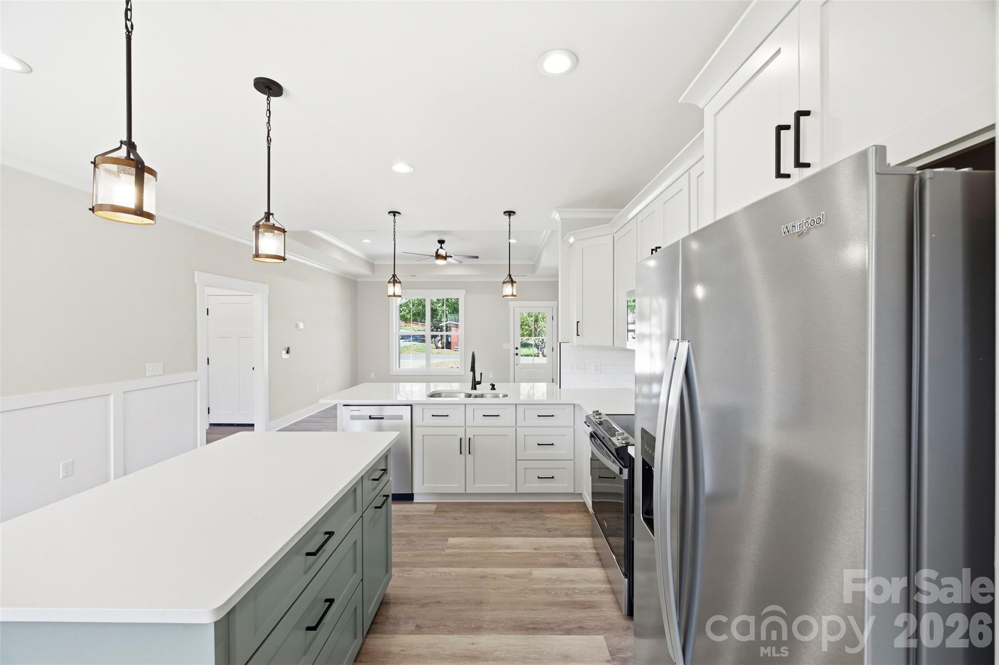 1014 Speight Road Albemarle, NC 28001 - Photo 11 of 28 a kitchen with a refrigerator a sink and dishwasher
