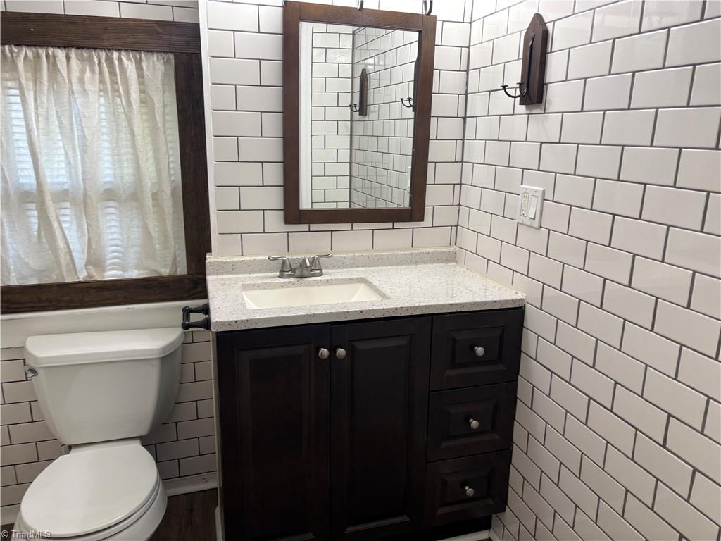 2327 Scalesville Road Summerfield, NC 27358 - Photo 12 of 28 SUBWAY TILE MAKES AN AWESOME STATEMENT