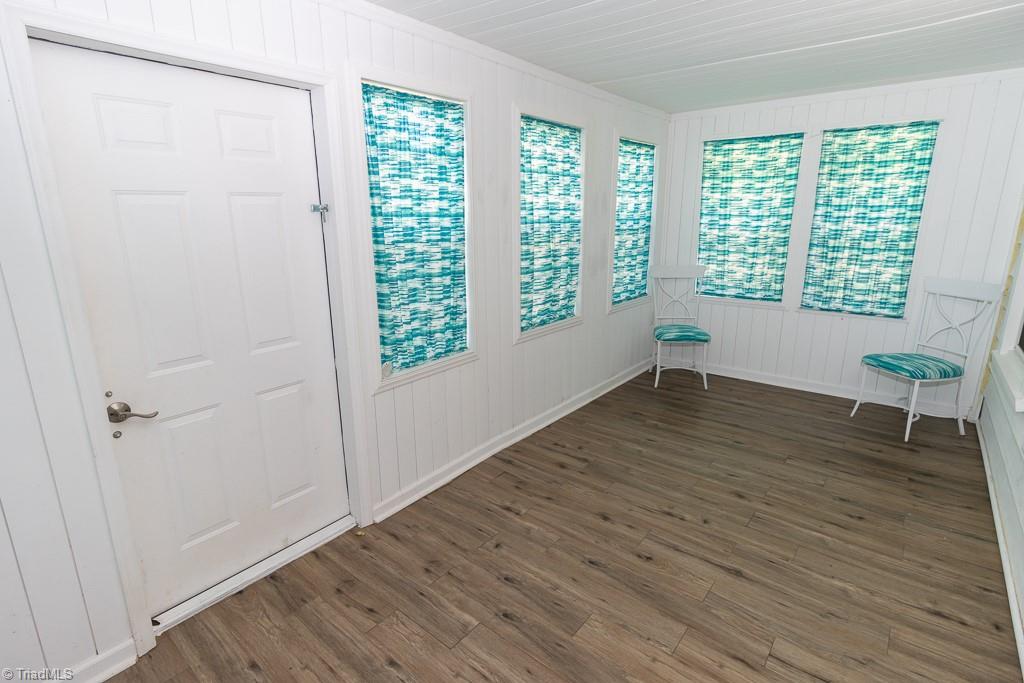 2327 Scalesville Road Summerfield, NC 27358 - Photo 7 of 28 THIS ROOM COULD HAVE DIFFERENT NAMES... I PERSONALLY WOULD USE THIS ROOM AS YOUR DINING ROOM. BUT IF YOU DON'T WANT A DINING ROOM, MAKE IT A SUNROOM.