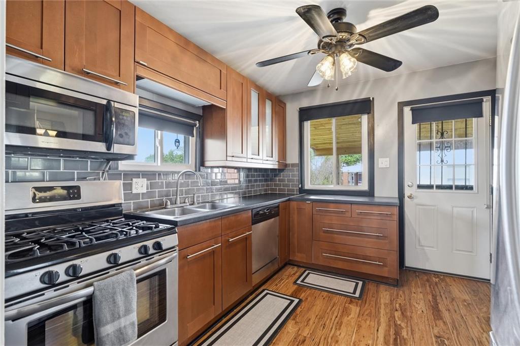 81 Coraopolis Road Coraopolis, PA 15108 - Photo 16 of 50 Kitchen leads to side new deck!