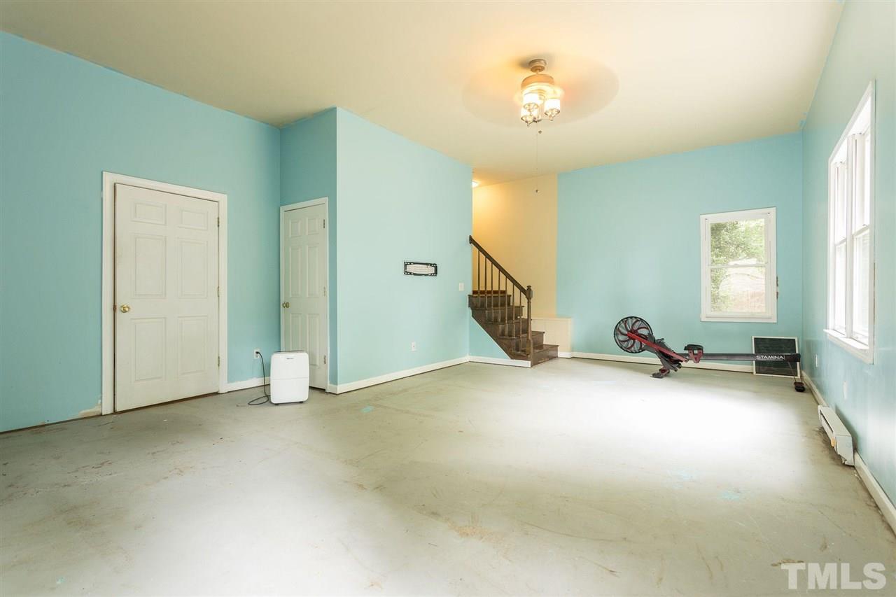 4116 Iron Horse Road Raleigh, NC 27616 - Photo 21 of 29 a view of a room with gym equipment