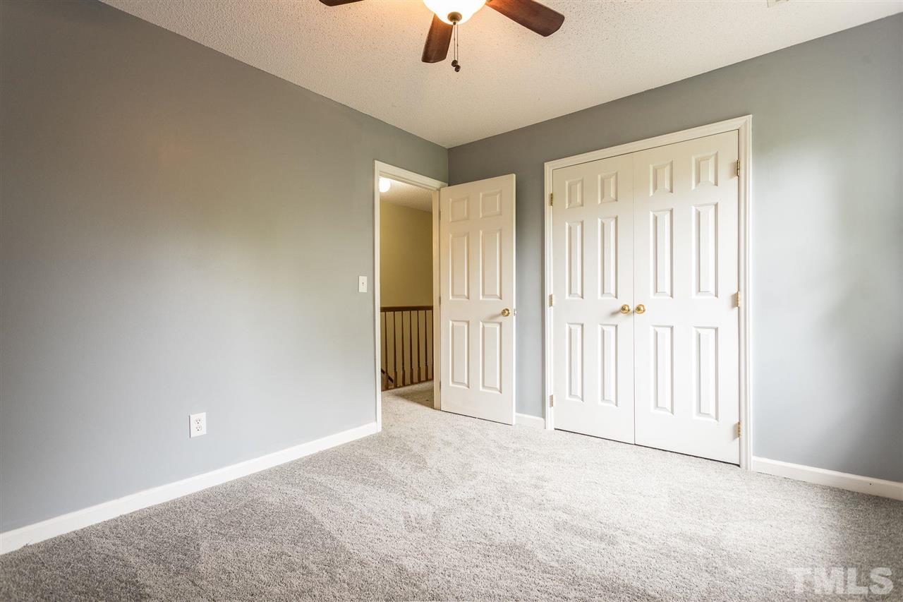 4116 Iron Horse Road Raleigh, NC 27616 - Photo 26 of 29 a view of an empty room and chandelier fan