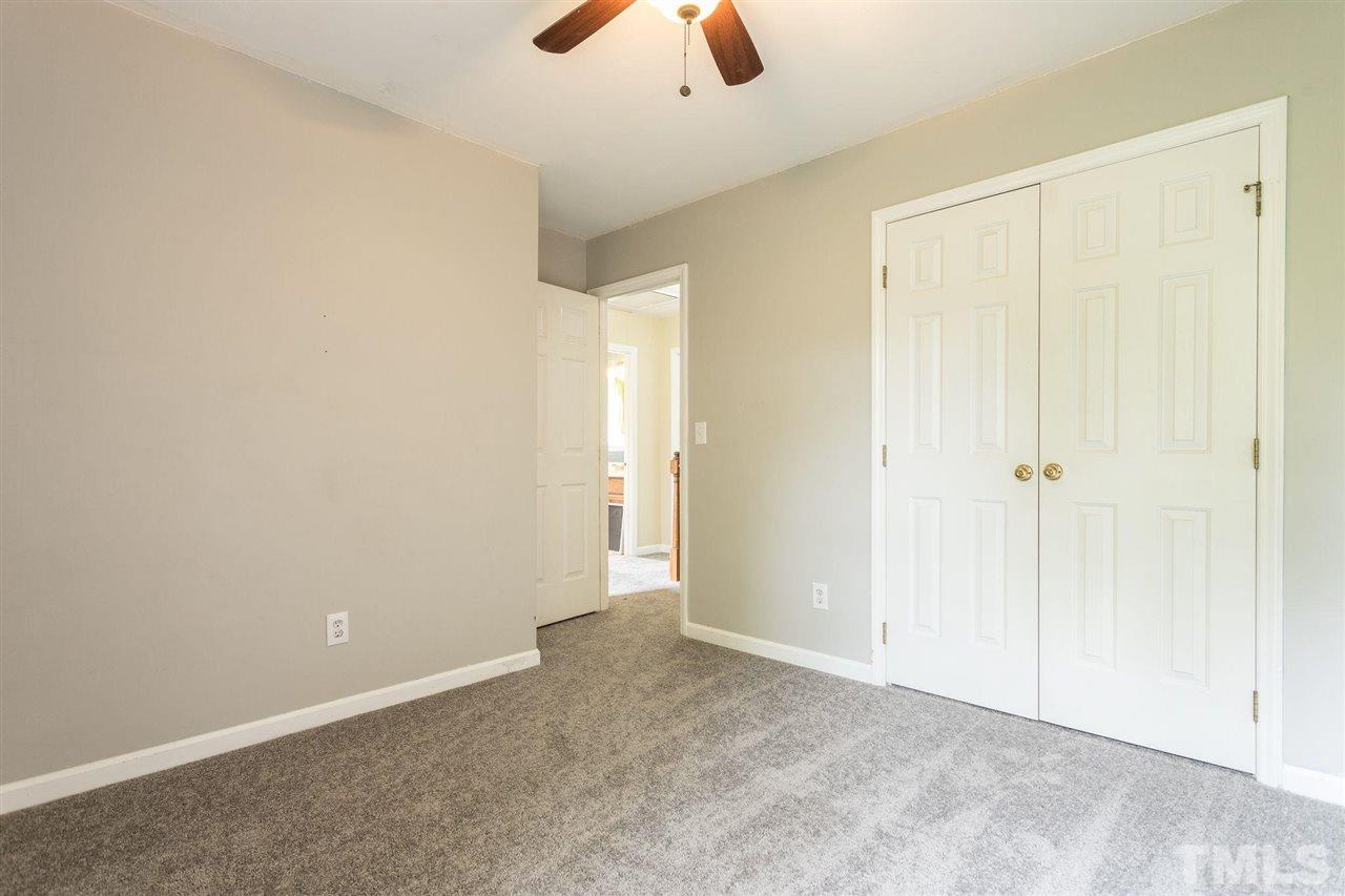 4116 Iron Horse Road Raleigh, NC 27616 - Photo 28 of 29 an empty room with fan and window