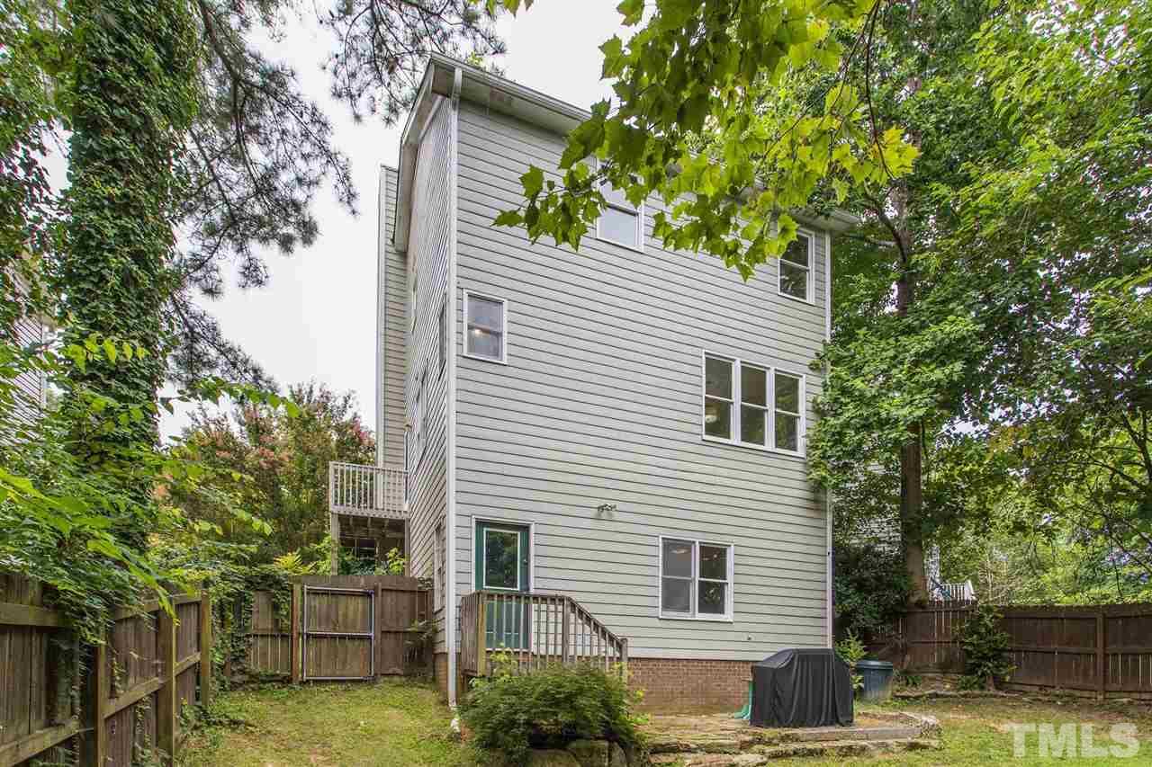 4116 Iron Horse Road Raleigh, NC 27616 - Photo 4 of 29 front view of a house with a tree