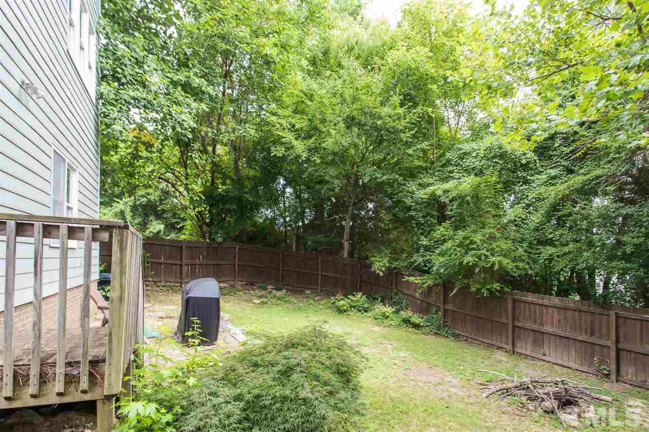 4116 Iron Horse Road Raleigh, NC 27616 - Photo 6 of 29 a backyard of a house with lots of green space