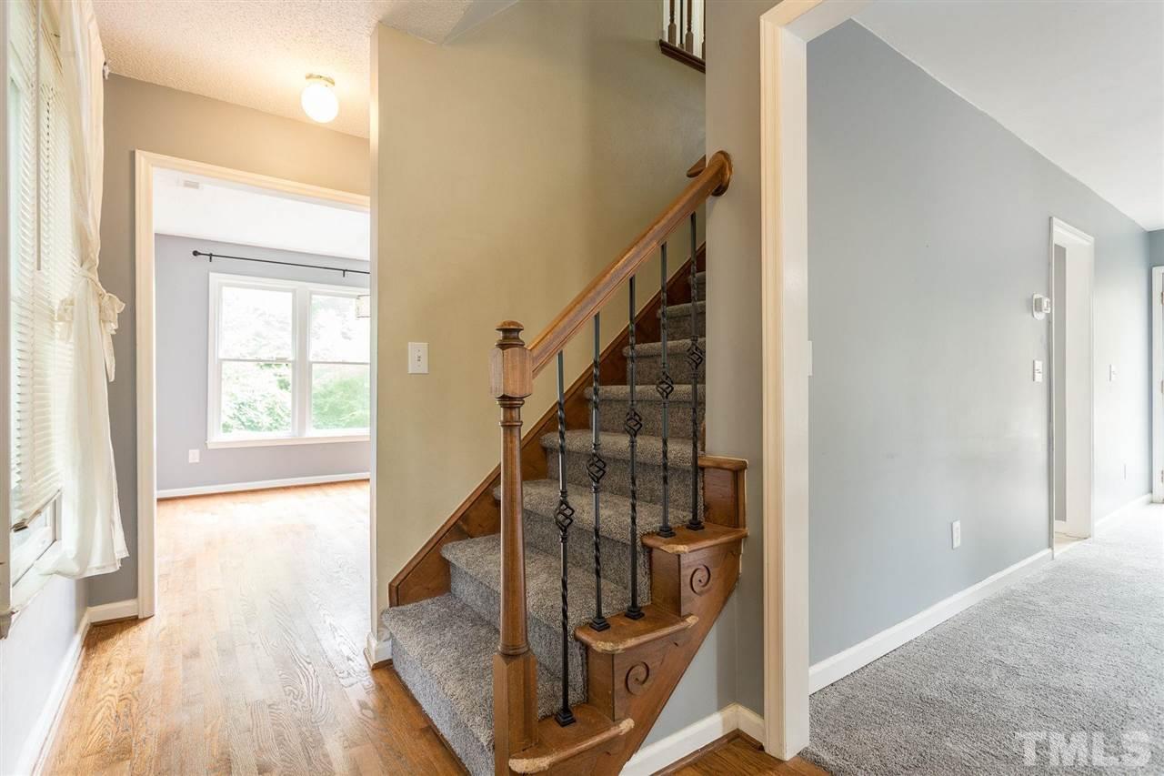 4116 Iron Horse Road Raleigh, NC 27616 - Photo 10 of 29 a view of entryway with wooden floor and stairs