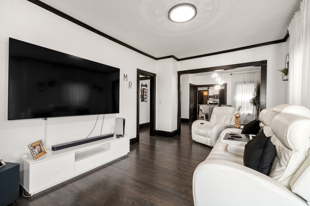 723 Main Street Southbridge, MA 01550 - Photo 20 of 41 a living room with furniture and a flat screen tv