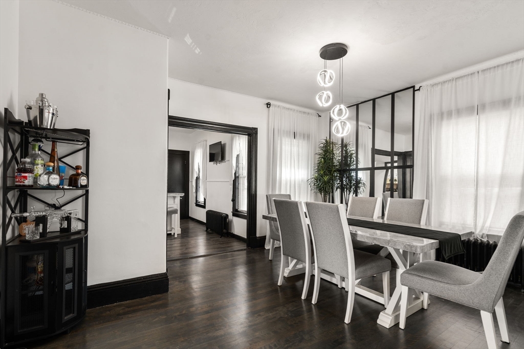723 Main Street Southbridge, MA 01550 - Photo 22 of 41 a view of a dining room with furniture window and wooden floor