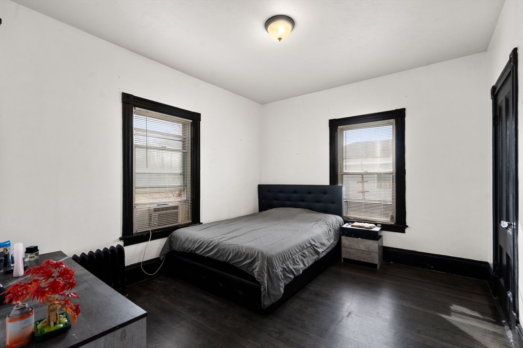 723 Main Street Southbridge, MA 01550 - Photo 25 of 41 a bedroom with a bed and window