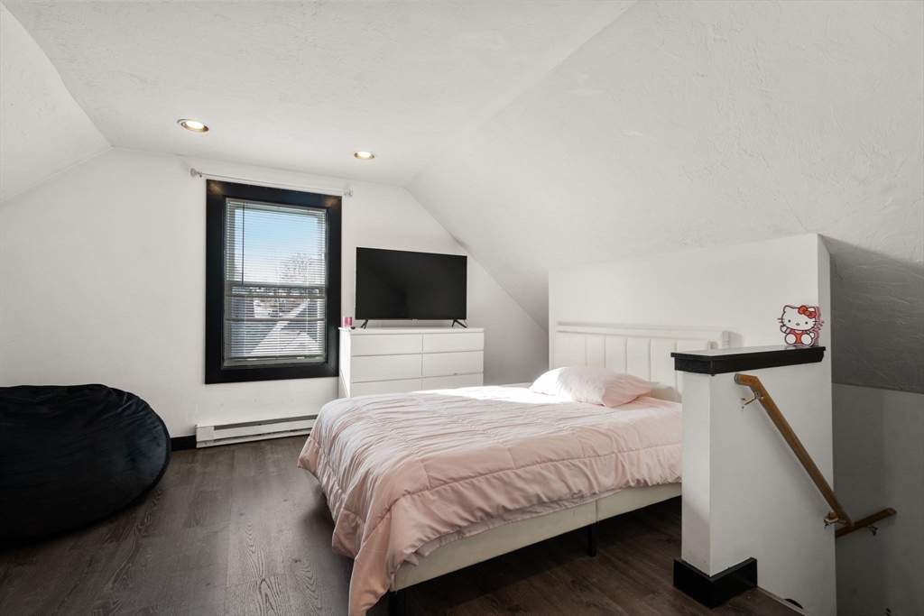 723 Main Street Southbridge, MA 01550 - Photo 34 of 41 a bedroom with a bed and a flat screen tv