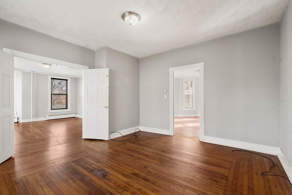 723 Main Street Southbridge, MA 01550 - Photo 5 of 41 a view of a livingroom with wooden floor