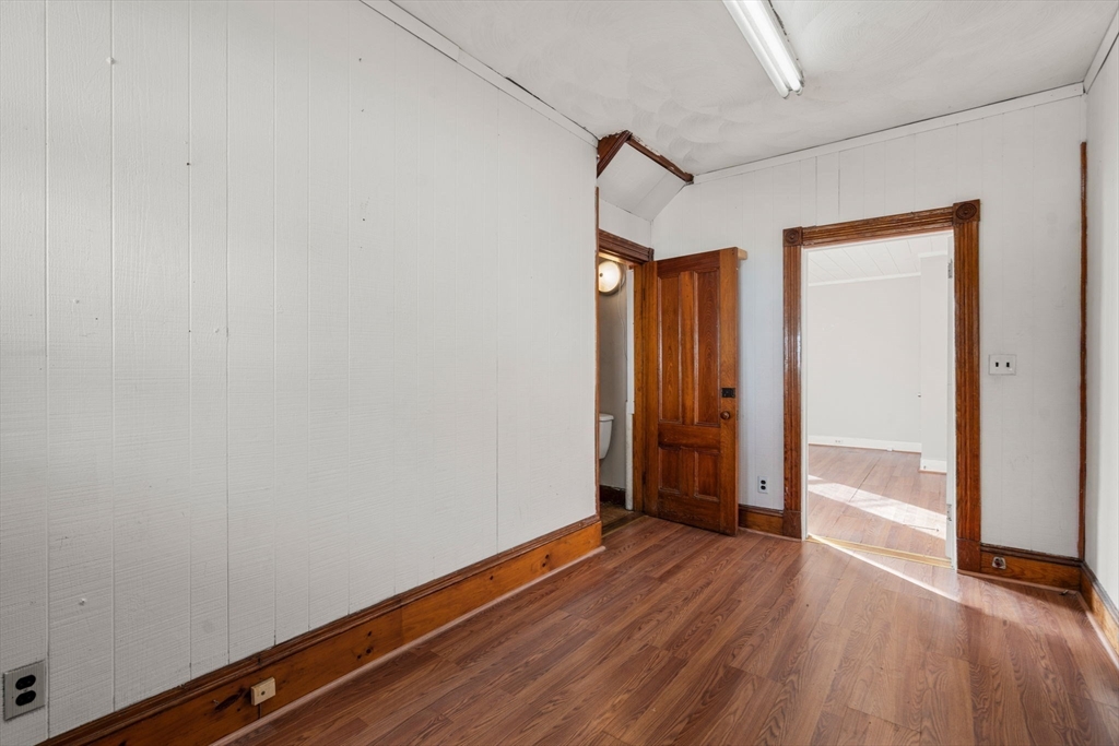 723 Main Street Southbridge, MA 01550 - Photo 9 of 41 a view of room with wooden floor