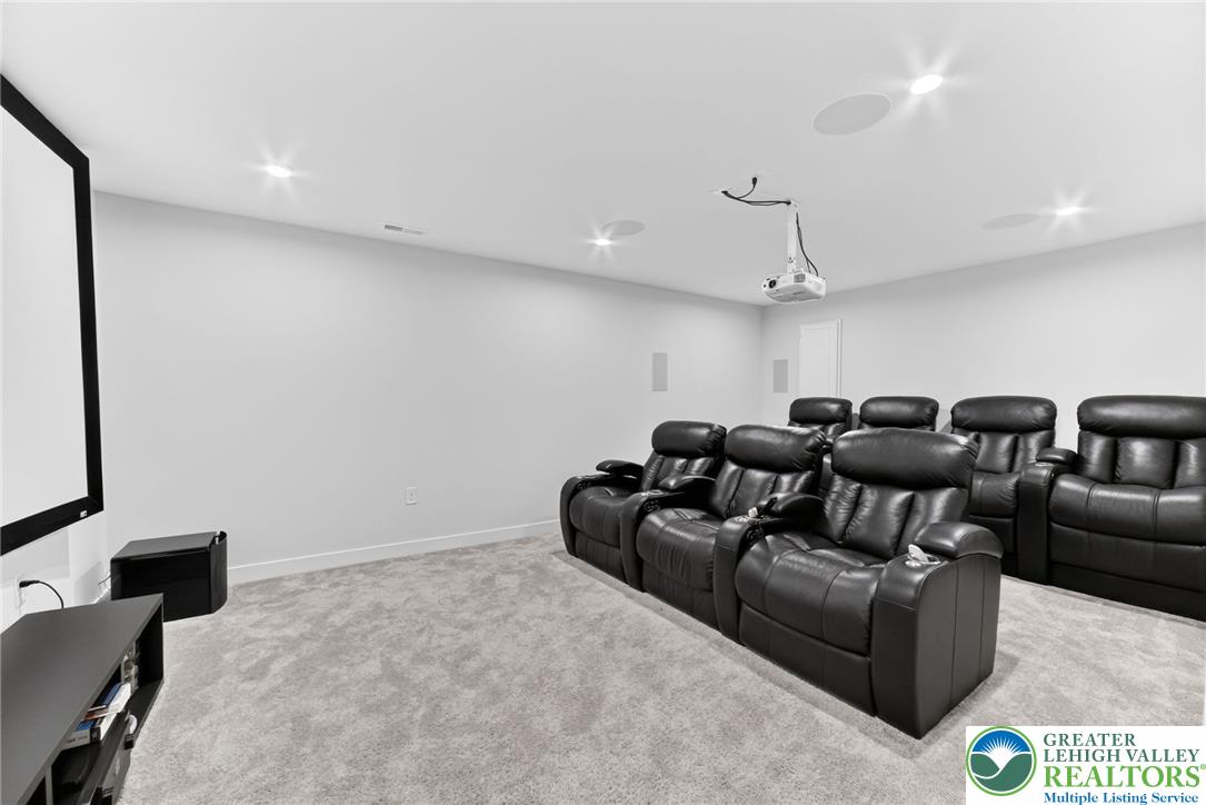 3952 Orth Street Bethlehem, PA 18020 - Photo 40 of 60 Indulge in cinematic experiences within this dedicated media room, featuring plush seating and optimal viewing technology.