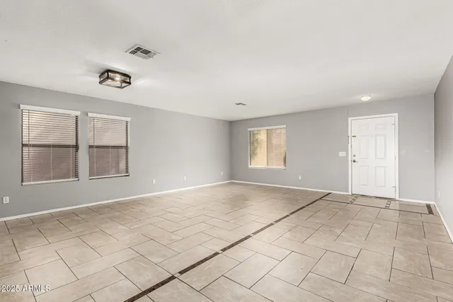 a view of an empty room and window