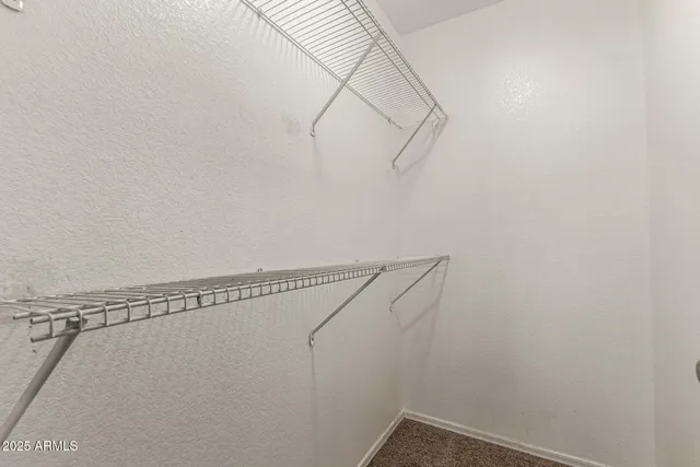 a view of small space with racks on the wall