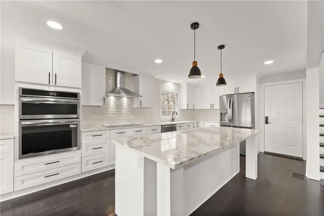 a utility room with washer and dryer