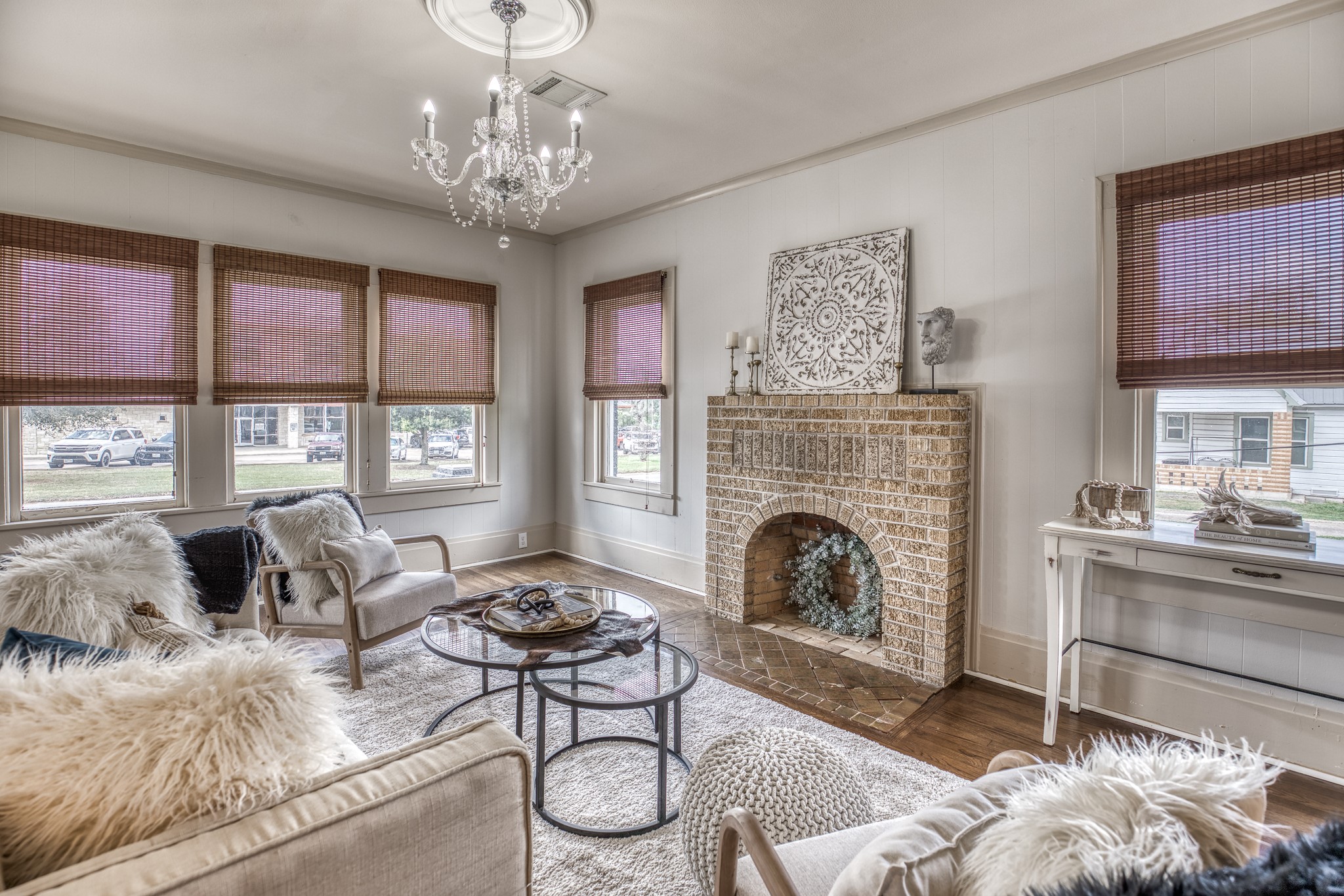 404 West Main Street Bellville, TX 77418 - Photo 2 of 36 a living room with furniture windows and a fireplace