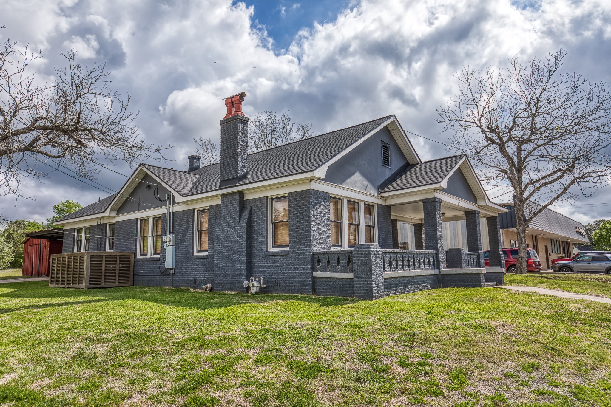 404 West Main Street Bellville, TX 77418 - Photo 22 of 36 a front view of a house with a garden