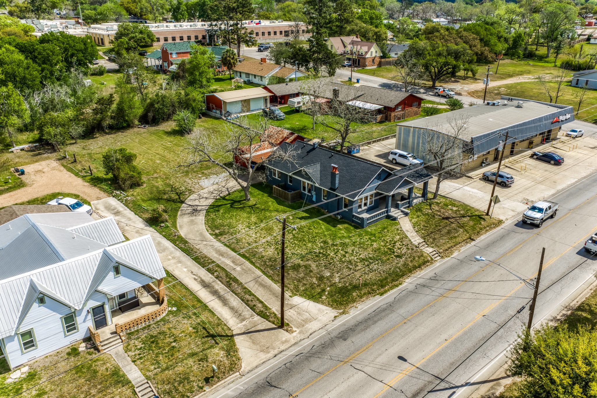 404 West Main Street Bellville, TX 77418 - Photo 35 of 36 an aerial view of a residential houses with yard