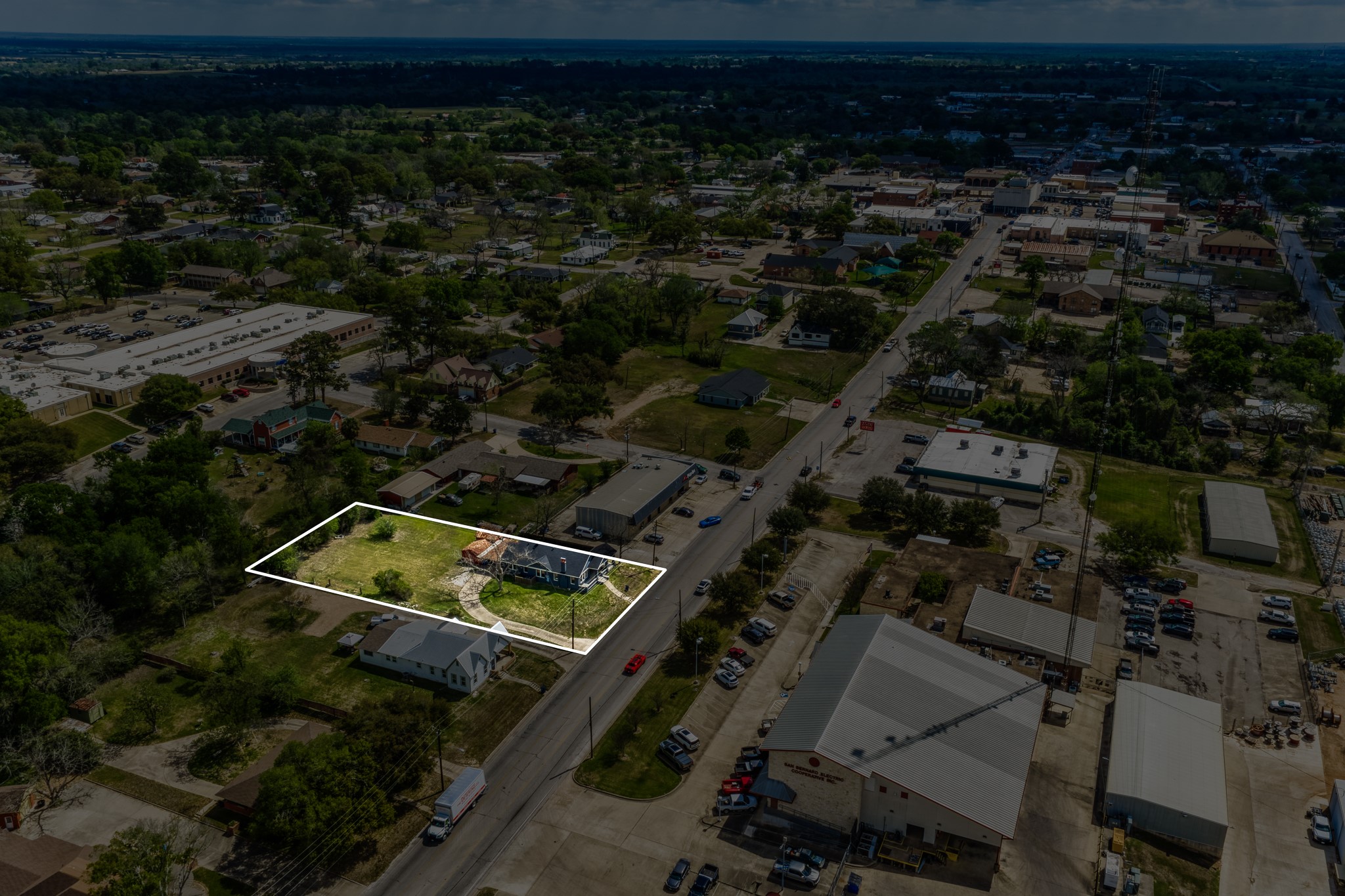 404 West Main Street Bellville, TX 77418 - Photo 36 of 36 an aerial view of residential house with outdoor space