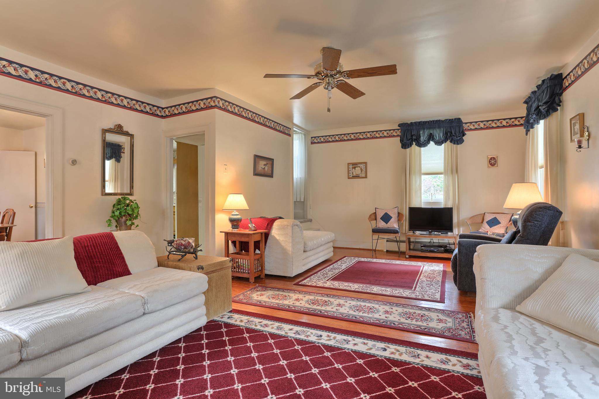 5541 Elizabethtown Road Palmyra, PA 17078 - Photo 5 of 31 Gleaming hardwood floors protected by area rugs