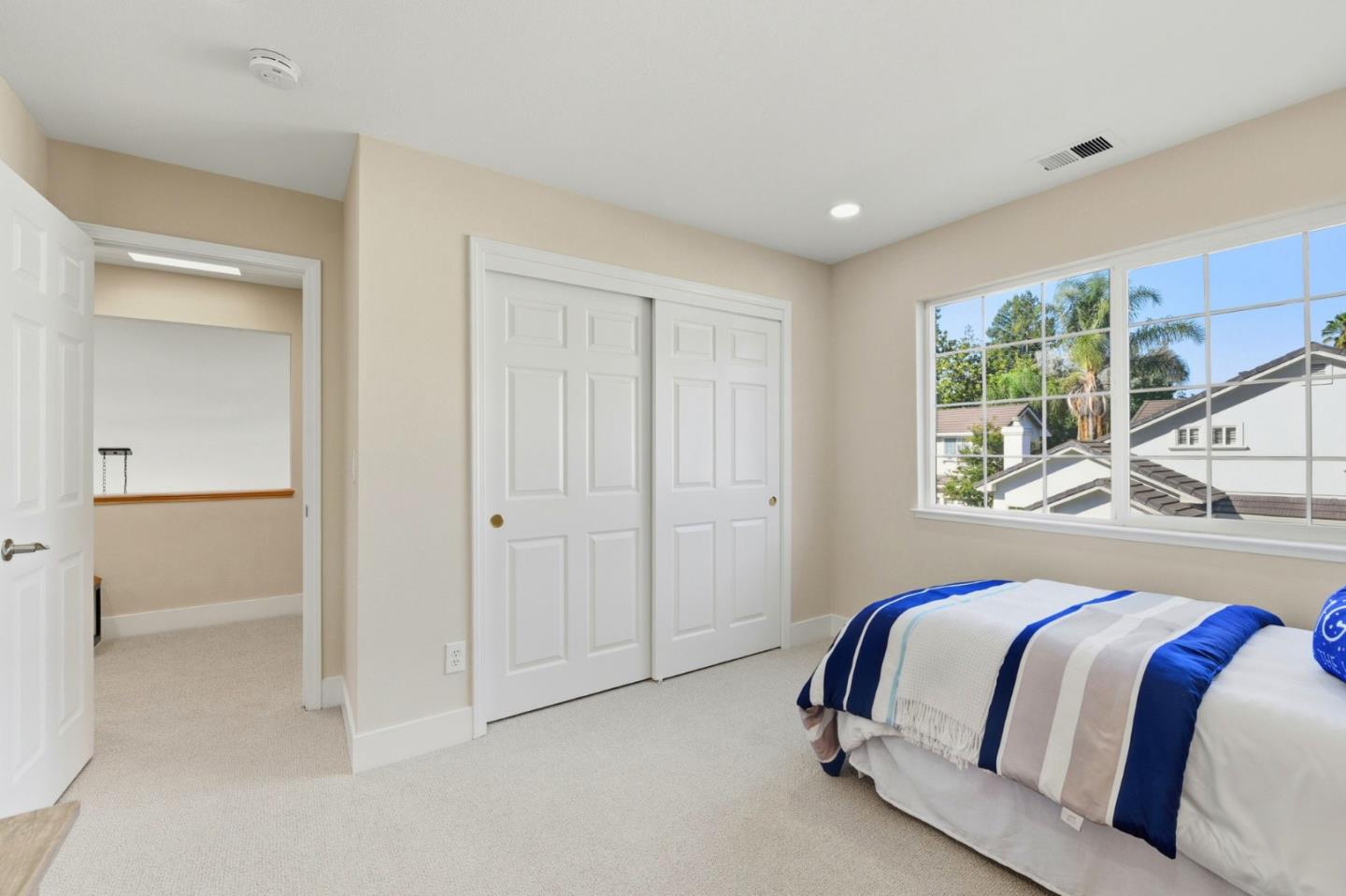 101 Glen Alpine Court Mountain View, CA 94043 - Photo 27 of 38 a bedroom with a large bed and a window