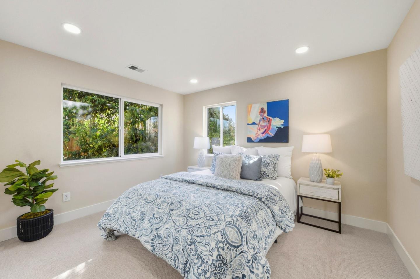 101 Glen Alpine Court Mountain View, CA 94043 - Photo 28 of 38 a bedroom with a bed and a potted plant