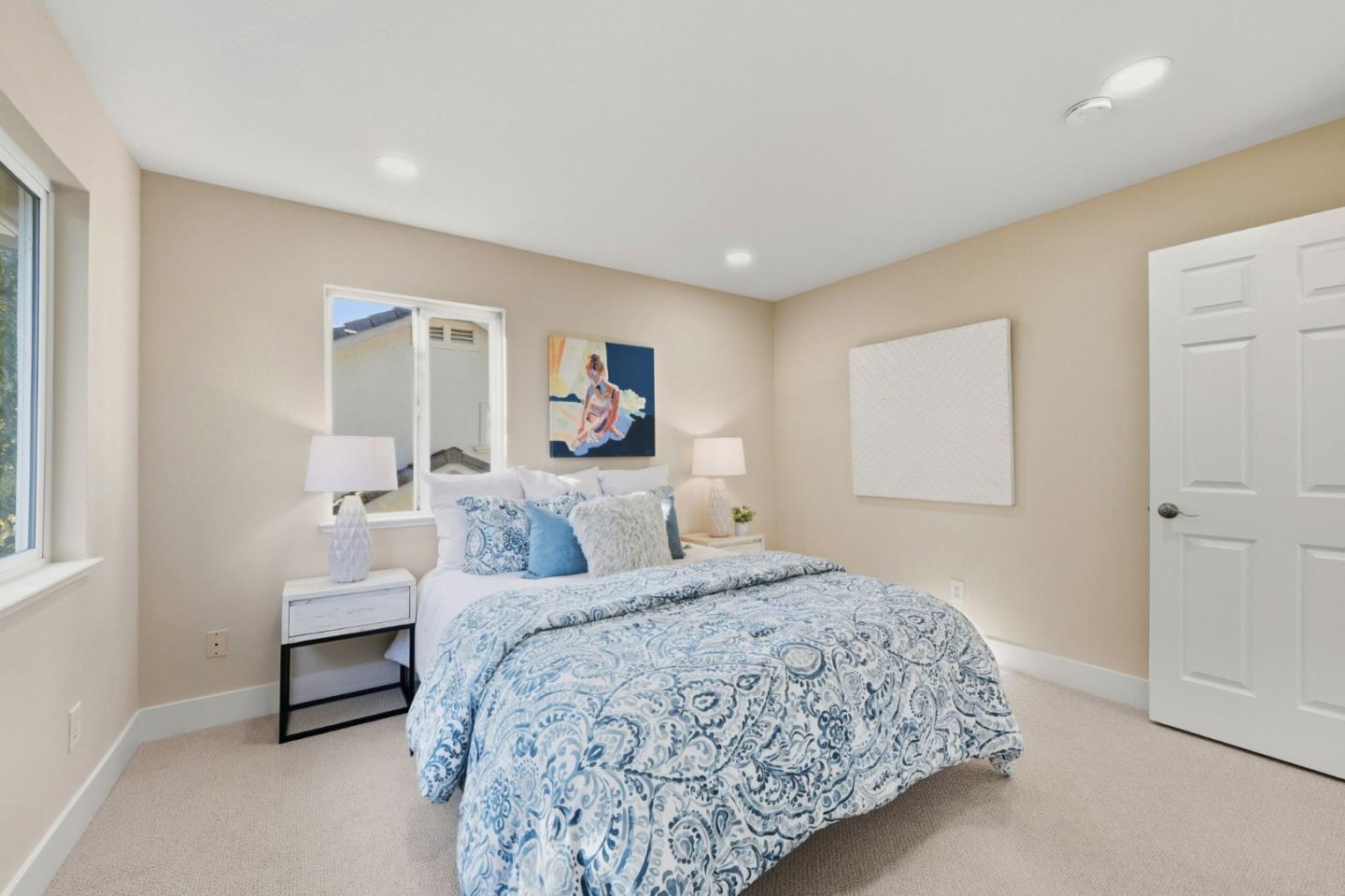 101 Glen Alpine Court Mountain View, CA 94043 - Photo 29 of 38 a bedroom with a bed and a painting