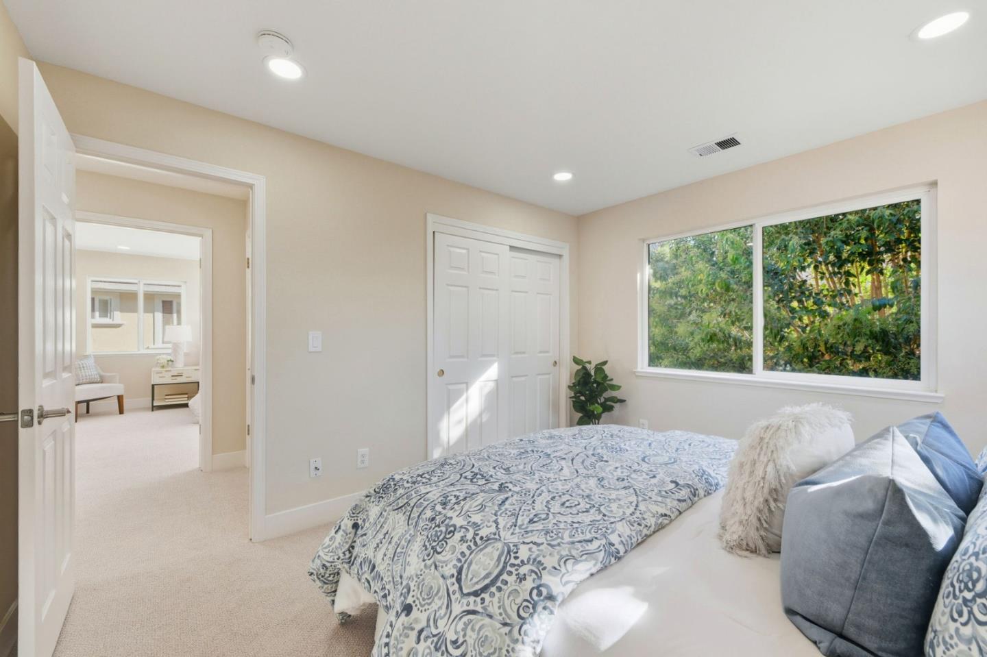 101 Glen Alpine Court Mountain View, CA 94043 - Photo 30 of 38 a bed room with a bed and a large window