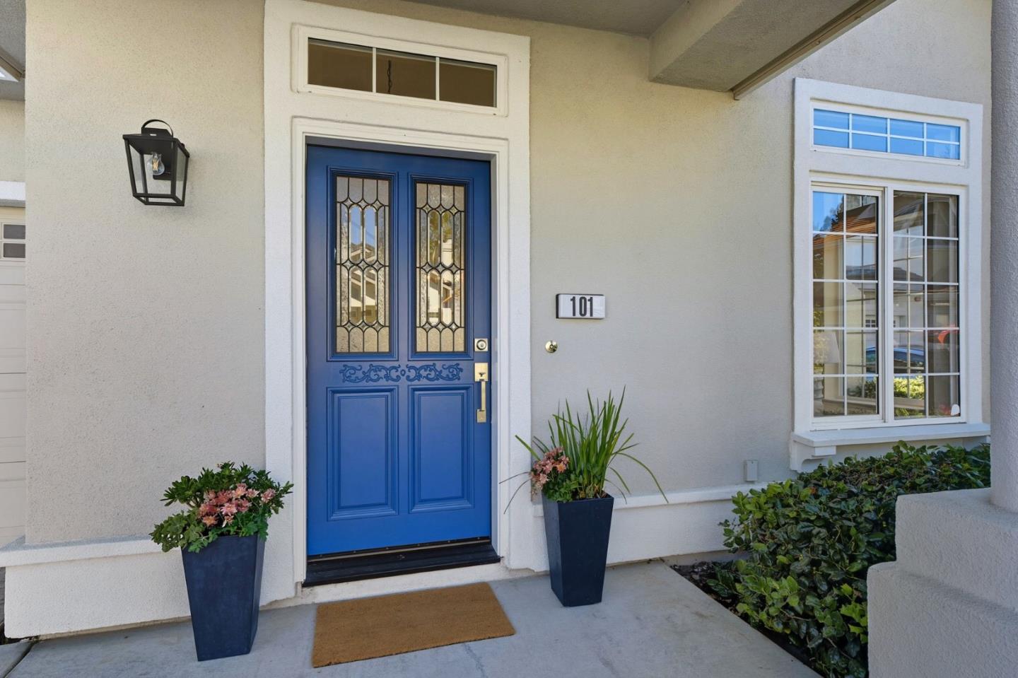 101 Glen Alpine Court Mountain View, CA 94043 - Photo 3 of 38 a potted plant sitting in front of a house