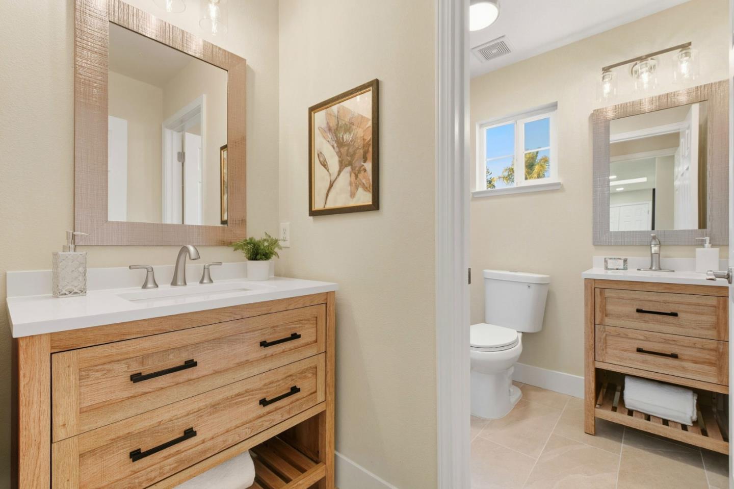 101 Glen Alpine Court Mountain View, CA 94043 - Photo 31 of 38 a bathroom with a sink vanity granite toilet and a mirror