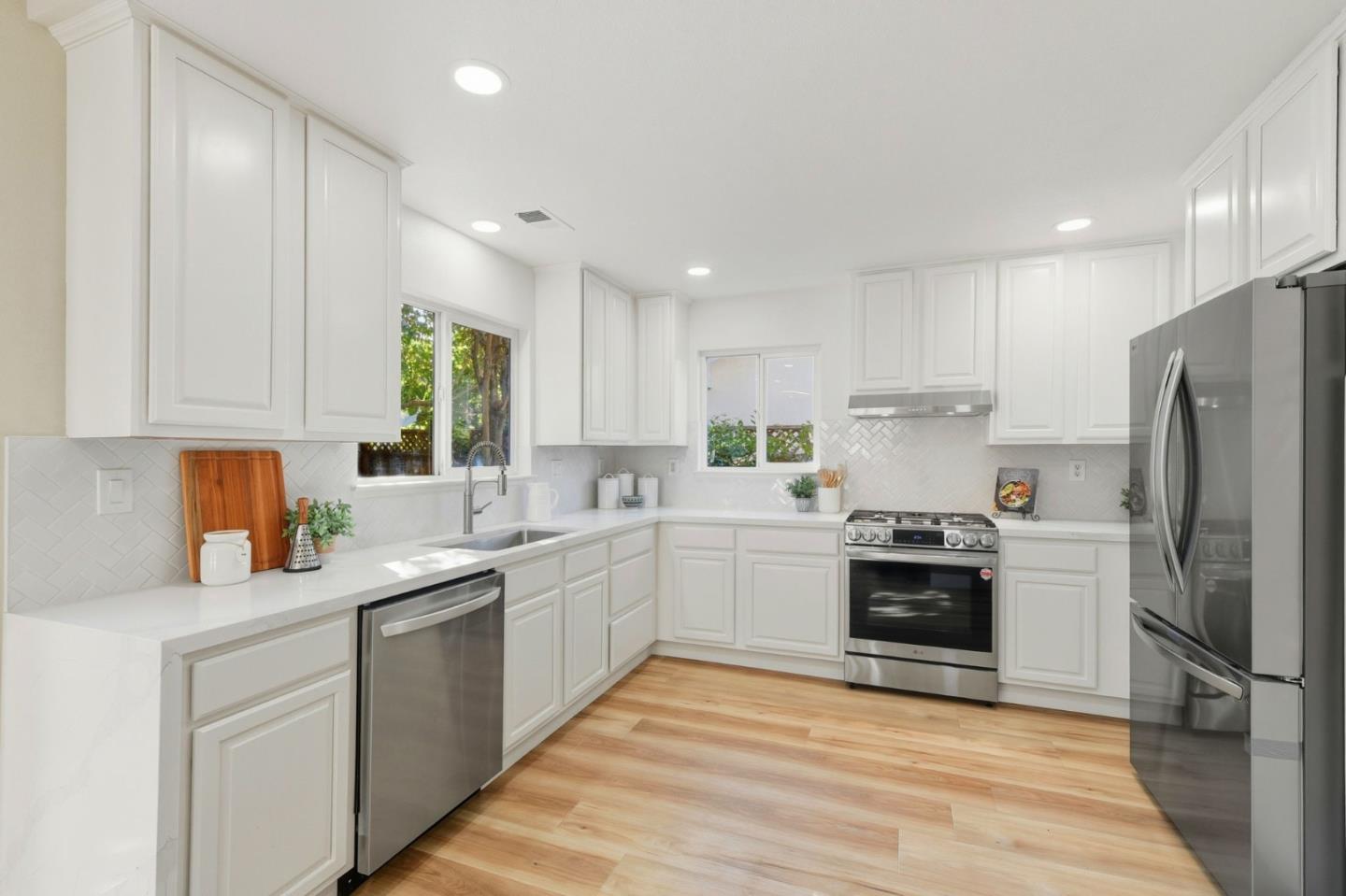 101 Glen Alpine Court Mountain View, CA 94043 - Photo 10 of 38 a kitchen with granite countertop a refrigerator stove top oven and sink