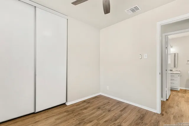 a view of small space with wooden floor