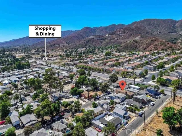 an aerial view of a city and mountain view